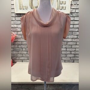 Baby pink two layer top.